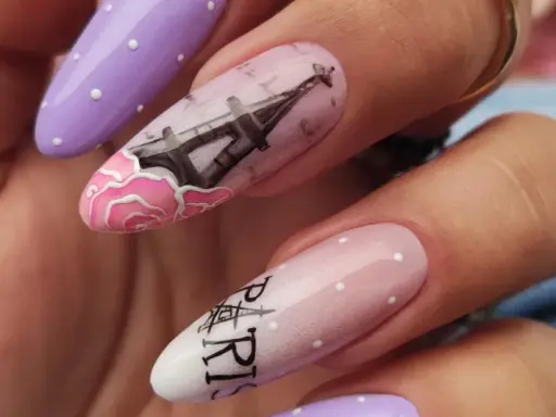 Manicure hybrydowy w stylu paryskim z wieżą Eiffla i różami.